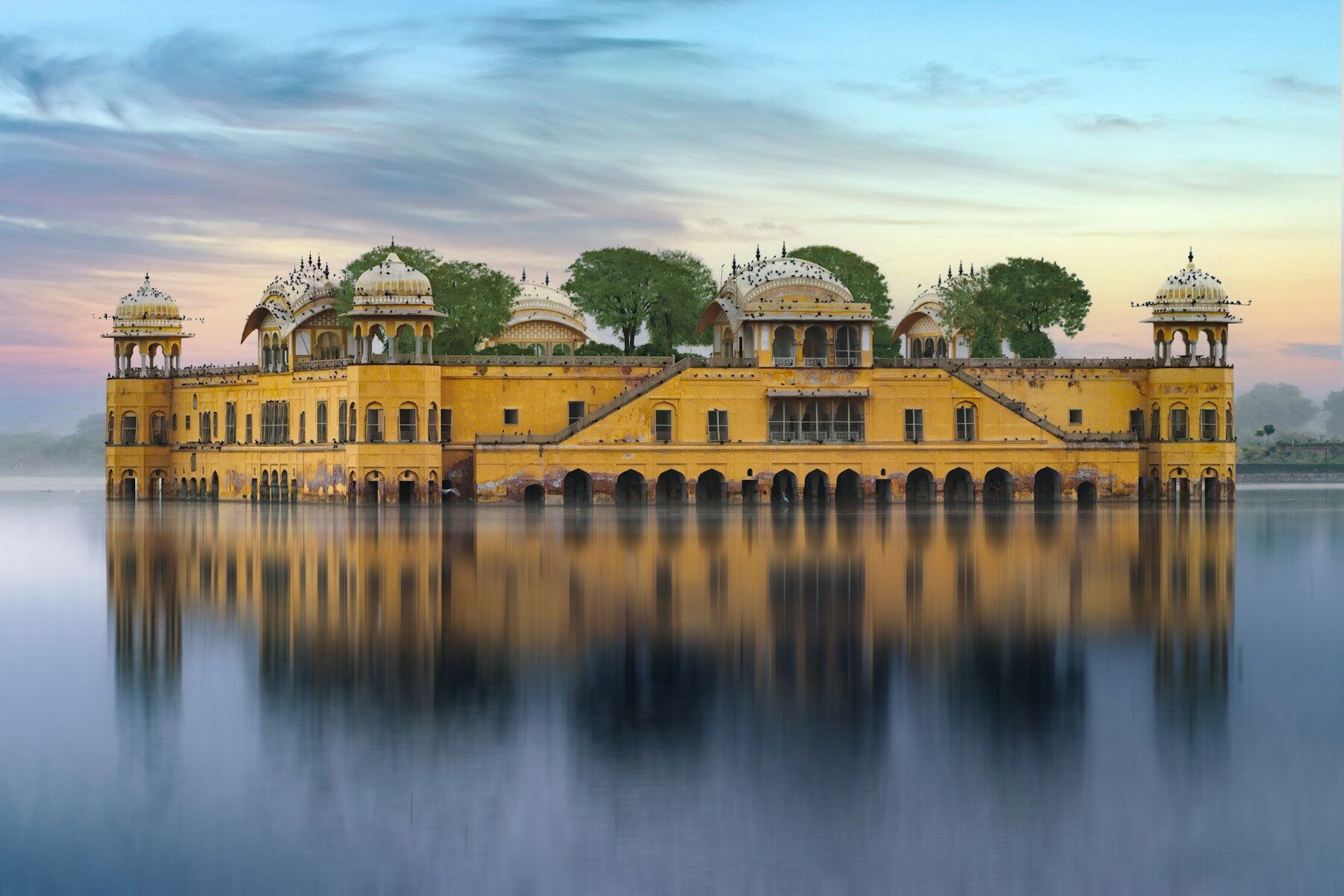 Jal Mahal palace standing in the lake on the edge of Jaipur