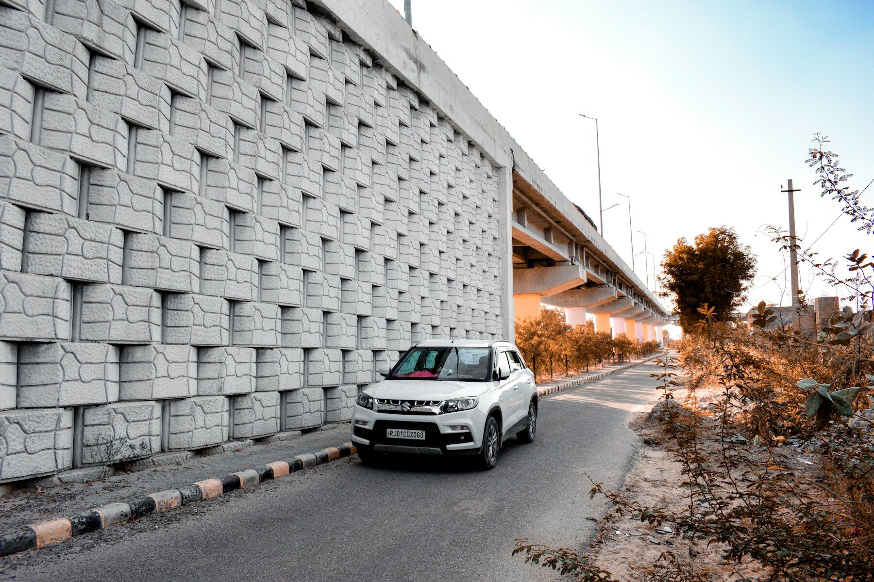 A car on an open road in Rajasthan